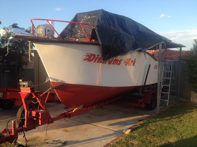 The boat nearly ready to go again.