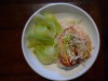 Miso-crusted grey-barred cod with seasame seeds, spring onions and bok choi over rice.